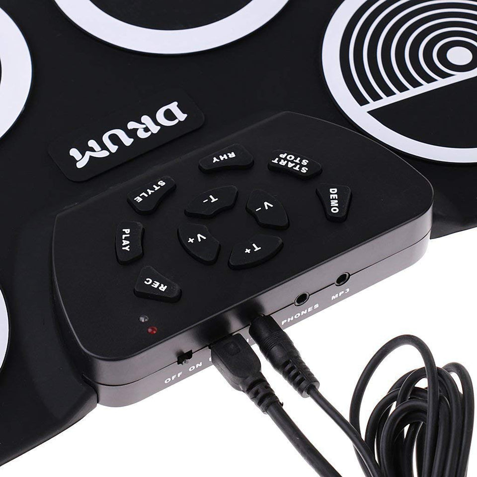 El tambor electrónico digital, rueda para arriba los kits del cojín de tambor construidos en altavoz 9 almohadilla el instrumento plegable portable de la práctica con 2 pedales del pie y el tambor pega el USB