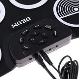 El tambor electrónico digital, rueda para arriba los kits del cojín de tambor construidos en altavoz 9 almohadilla el instrumento plegable portable de la práctica con 2 pedales del pie y el tambor pega el USB